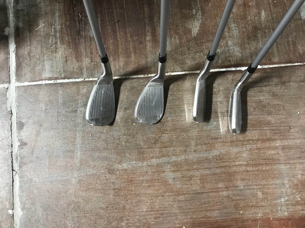 New Top Flite Mix Flawless 4 piece Iron Set 7,9 Wedge, Sand Wedge brand new Golf